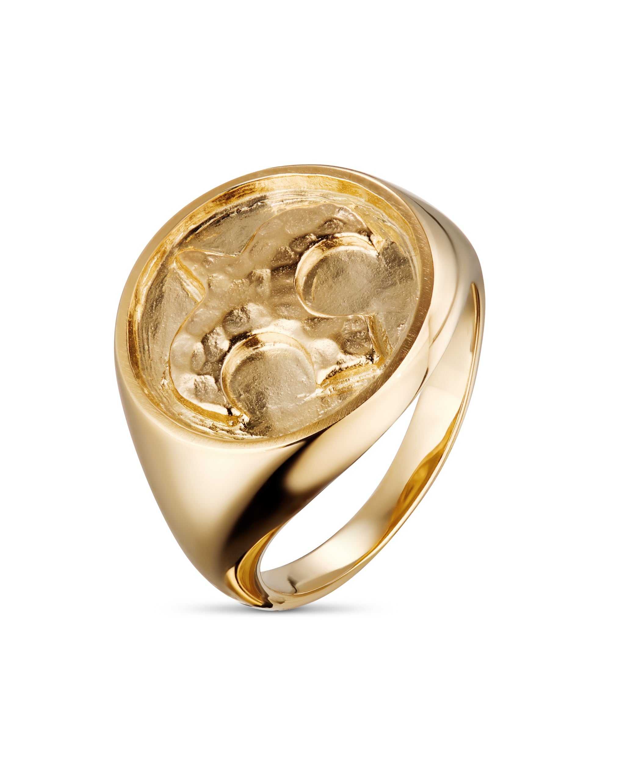 Gold ring with a textured surface on a white background