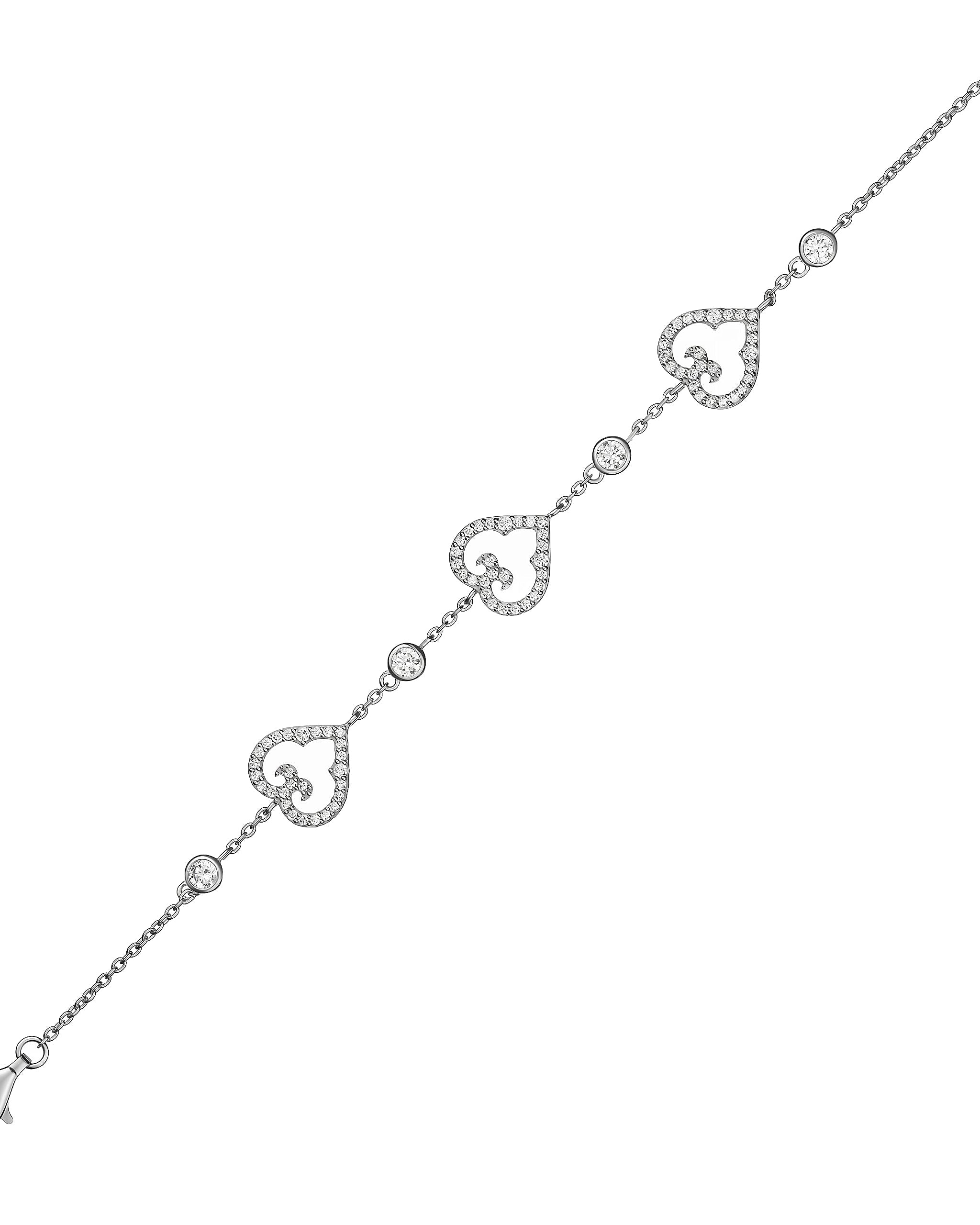 Silver bracelet with heart-shaped links on a white background